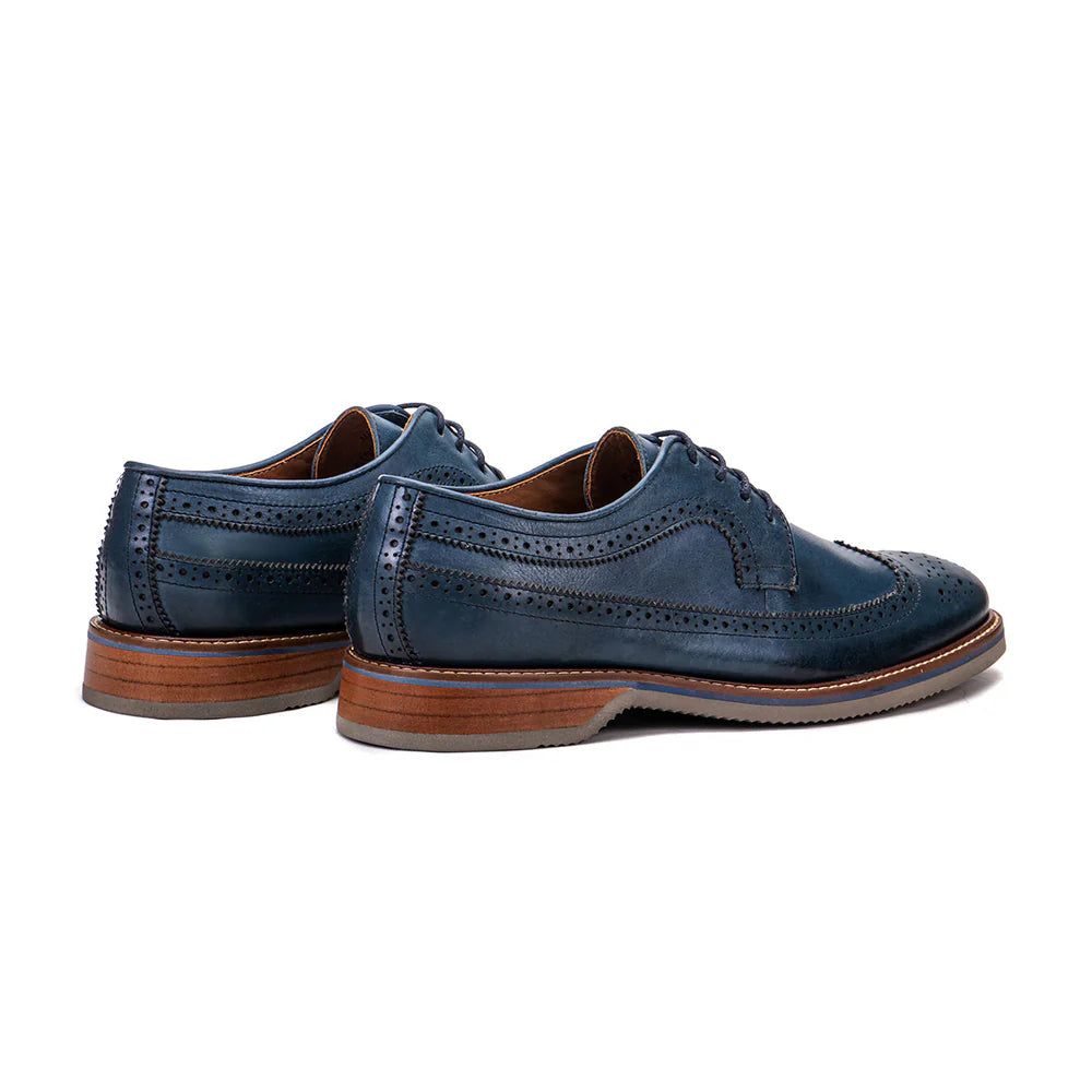 Classic blue leather wingtip derby shoes