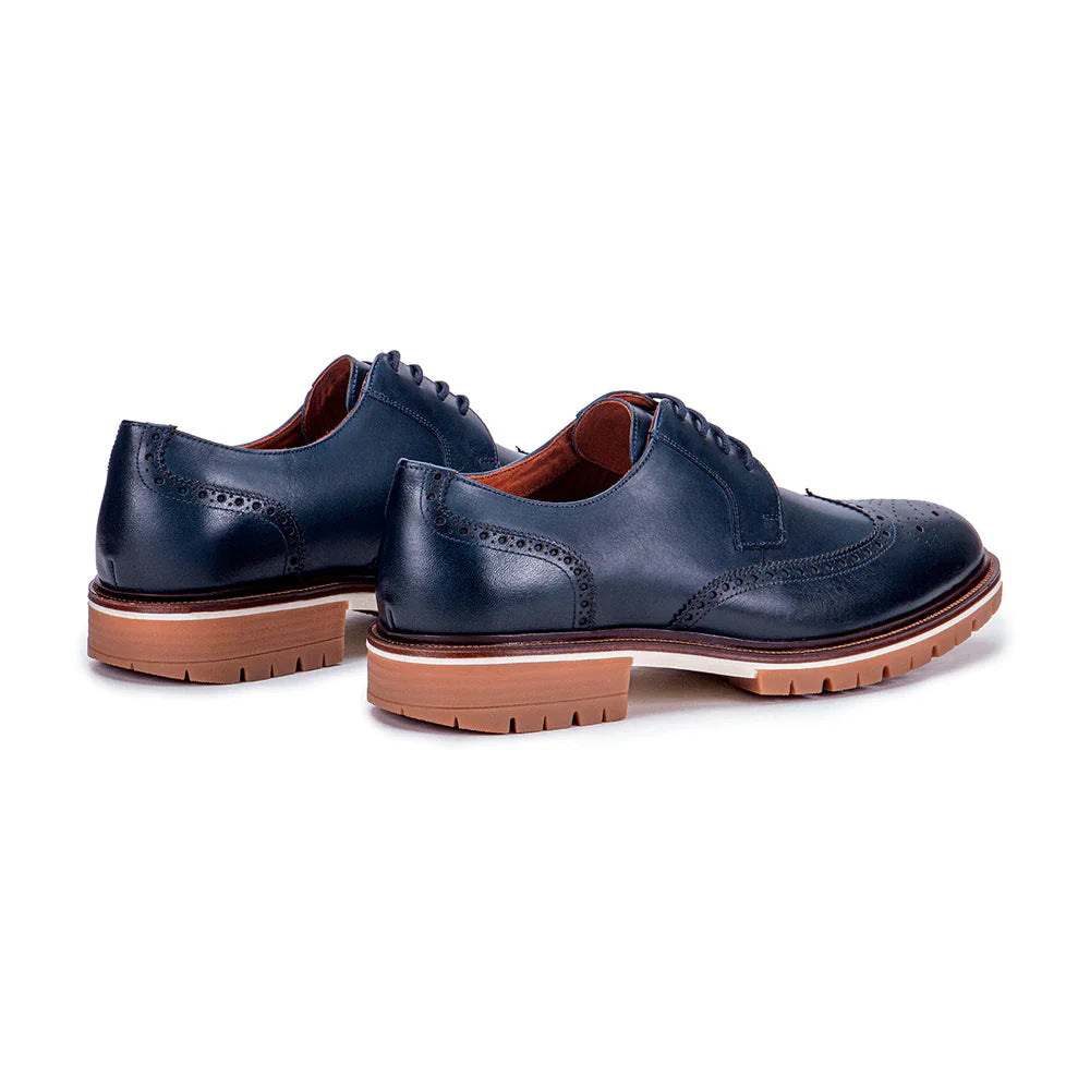 Navy blue leather wingtip derby shoes